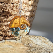 Load image into Gallery viewer, Golden ... Beyond the Sea lentil pendant